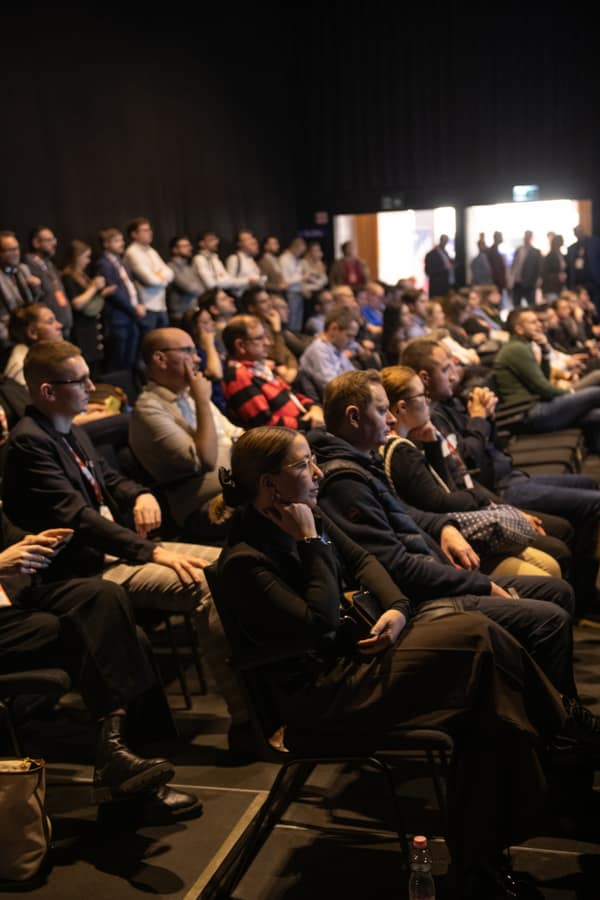 Full auditorium during a session